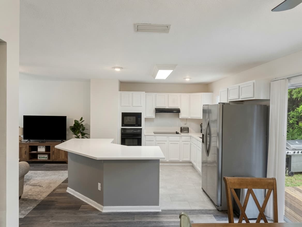 Two Houses — A Wave Away side: open living space